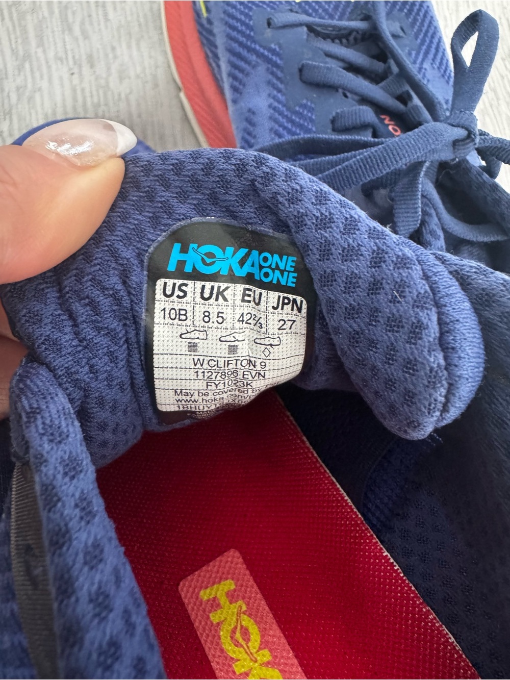 Hoka One One Navy Running Shoe with Coral and Yellow Accents - Picture 3 of 5